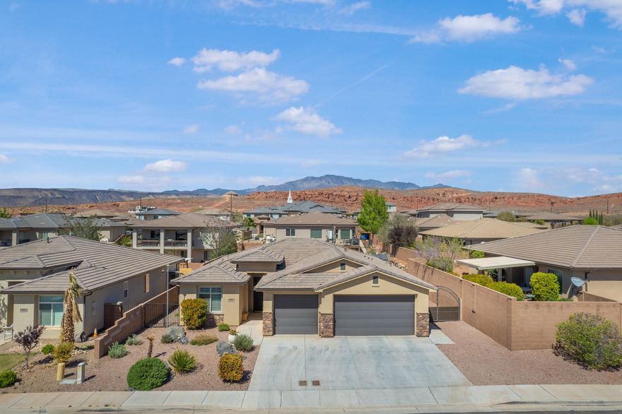 Welcome to your like-new home in Perry Landing, where everyday living just got a whole lot easier. This beauty features a spacious open concept layout flooded with natural light thanks to gorgeous skylights. The kitchen boasts a walk-in pantry, and the built-in entertainment center is ready for movie nights.

Outside, you have got a comfortable covered patio with a spa, paver walkways, and natural gas stubbed out for your dream backyard setup. The three car garage comes with epoxied floors and a thirty amp outlet. Dog parents will love the ready-to-go dog run with gates already installed. Storage shed included too.
Freeway access and amazing trails are just minutes away. Schedule your tour today!