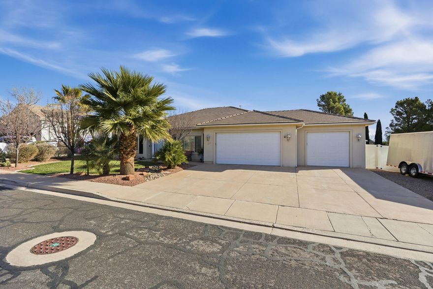 Tucked into the quiet Pueblo Bonita subdivision in Ivins, this well-maintained single-level home offers 2,033 square feet on a .21-acre lot with three bedrooms, two bathrooms, and an oversized three-car garage.
The home features extensive updates, including a remodeled primary shower, newer interior paint, updated lighting, shutters and blinds, new appliances, modern hardware, and upgraded finishes throughout. The kitchen includes backsplash, under-cabinet lighting, a microwave, reverse osmosis, and a water softener. A smart thermostat, central vacuum, and updated A/C add comfort and efficie The oversized three-car garage is built for function, featuring epoxy floors, built-in shelving and workbench, a utility sink, new garage doors and openers. A transfer switch allows the home to run on a generator during power outages. Exterior upgrades include RV parking, landscaped yard, updated sprinkler system, gutters, and a custom 10x12 shed.
Located within walking distance to Vista School and Rocky Vista University, and minutes from the Greater St. George paved trail system, the home offers easy access to Snow Canyon, red rock landscapes, and miles of biking and walking trails. Ivins is known for its dark-sky initiative, Red Mountain views, and proximity to Zion, Bryce Canyon, and the North Rim of the Grand Canyon.

All information is deemed reliable but not guaranteed. Buyer to verify all information to their own satisfaction.
