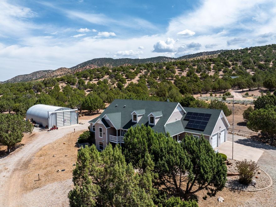 Discover a rare blend of space, privacy, and breathtaking views with this meticulously maintained 6.38-acre property. Nestled against the mountainside, the home offers sweeping western vistas — the perfect backdrop for Cedar City's magnificent sunsets.
The grounds have been pristinely cared for, featuring well-manicured trees and even your own private stop light — a unique landmark that makes this property truly one of a kind. Wildlife lovers will be delighted as deer roam freely across the property, adding to its serene charm.
A massive 40' x 60' steel shop provides endless possibilities for storage, hobbies, or a home-based business. The home's wrap-around deck invites you to relax outdoors and take in the views from every angle.
Inside, the main floor offers 3 bedrooms and 2 bathrooms with a spacious, functional layout. The unfinished basement is a blank canvas ready to accommodate 2 additional bedrooms and another bathroom or to be customized to your vision. .5-acre ft of water included.
All information is deemed reliable but not guaranteed. Buyer and buyer's agent to verify.