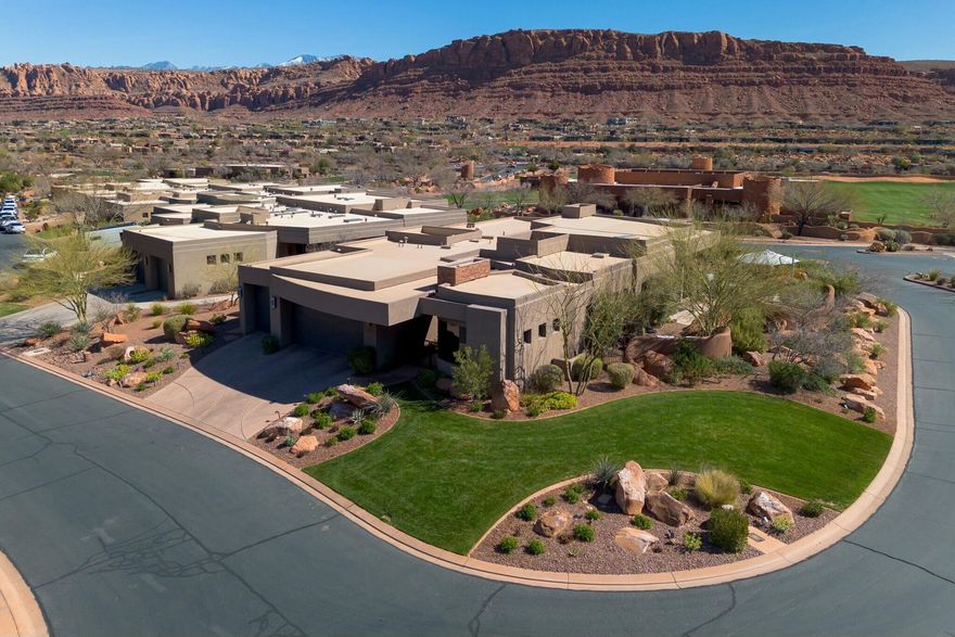 Stunning 2013 Parade home in the gated Entrada at Snow Canyon master-planned community. Recently remodeled inside and out, this turnkey residence features four en-suite bedrooms plus a charming standalone casita. The home is uniquely approved for nightly and weekly rentals, making it an excellent investment or vacation property.

Beautiful outdoor living areas with picturesque views of the Kachina Cliffs--perfect for entertaining. Close to the community club, fitness center, pools, restaurant, and other amenities.