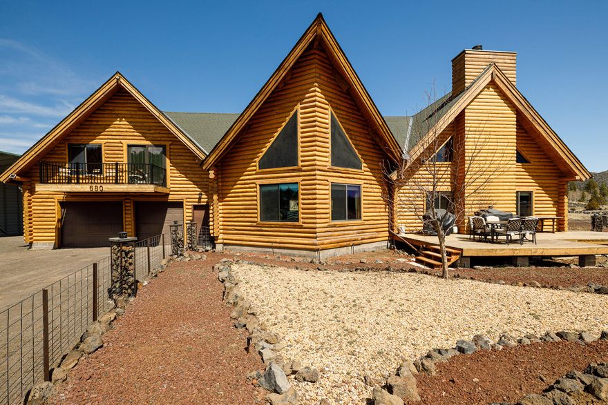 Stunning, spacious cabin just minutes from Panguitch Lake. 5 bedrooms, 4 baths, a bunk room in the finished basement, a spacious kitchen and dining area that seats 18. A massive 3-car garage for all your outdoor toys. Currently being ran as a Vacation Rental with bookings in place for ready profit. This is the perfect basecamp for outdoor adventure. Whether you're into ATVing, skiing, hiking, or snowmobiling, this cabin puts you at the heart of it all: only 20 minutes to Brian Head Resort, 5 min to Panguitch Lake, 50 minutes to Bryce Canyon, and 25 minutes to Duck Creek Village. Plus, it offers year-round access! Built for comfort and convenience, this cabin features modern upgrades like Nest thermostats, Ring cameras, and two cozy lofts. With RV parking, hookups, and nearly 1.5 acres of