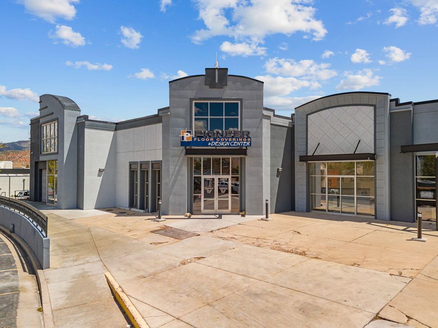 Prime commercial lease opportunity within Pioneer Plaza offering 6,404 SF of flexible space with excellent I-15 visibility and close proximity to the freeway exit. Offered at $2.00 per square foot. Centrally located in the heart of town, this property is ideal for a variety of commercial uses. Features include a showroom area, one shipping dock, and the ability to add a wall for customized configurations if needed. Offered as a Triple Net (NNN) lease, this space provides excellent accessibility, exposure, and long-term business potential. Great opportunity for an anchor business seeking a high-traffic location with strong visibility. CAM Fees include tax, snow removal, parking lot, ext maintenance.