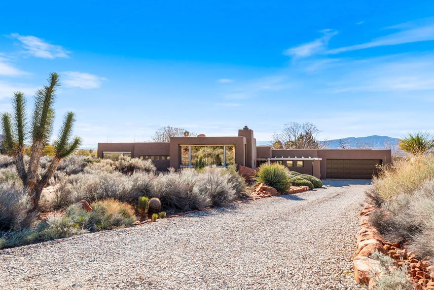 A rare opportunity to live in the absolute heart of the Kayenta community on an estate-sized 1 acre lot for $925,000!  This 2,239 square foot, 3 bedroom, 2 bath, 2 car garage home was built in 1994 and just received a brand new roof and exterior paint job and recent HVAC upgrades.  The home has extensive outdoor entertaining spaces and an expansive grassy backyard, surrounded by stunning mature landscaping.  The primary bedroom is located at the opposite end of the home from the main guest bedroom.  The open  floorplan has extensive windows to the north, east and south to best showcase the towering red cliffs and desert sagebrush.  Enjoy stunning sunsets, protected night skies, privacy and seclusion...all within a short walk to the Kayenta Art Village!  1063 is special.  Come see why!