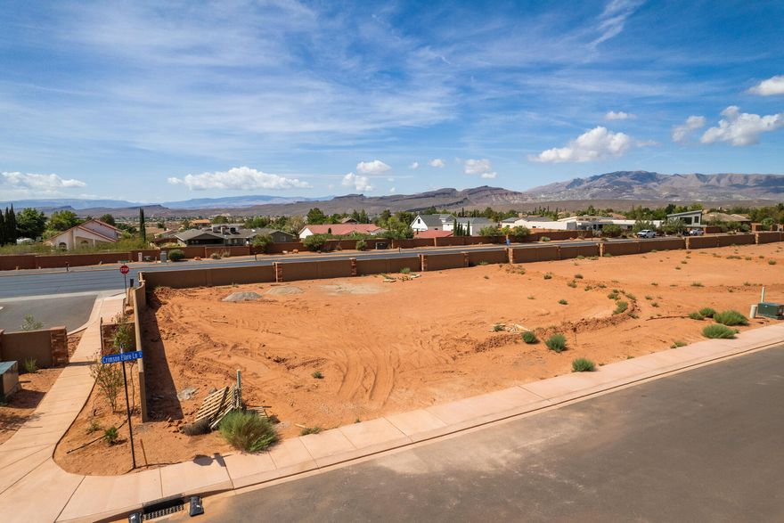 Newly released, north facing home lot at The Palisades at Snow Canyon. This master-planned gated community offers beautiful homes at the foot of Red Mountain and Snow Canyon State Park. Enjoy private homeowner amenities, including clubhouse, sport courts, pools, walking trails, and more. Choose among one of the Palisades Approved Builders and build your dream home.