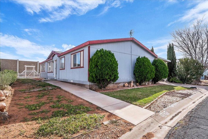 Charming home located in 55+ community of Lava Bluff featuring a spacious layout and numerous updates. The kitchen offers white cabinetry, stainless steel appliances and generous counter space. Enjoy updated paint and LVP flooring in main living areas. The property also includes a private yard with space for gardening.