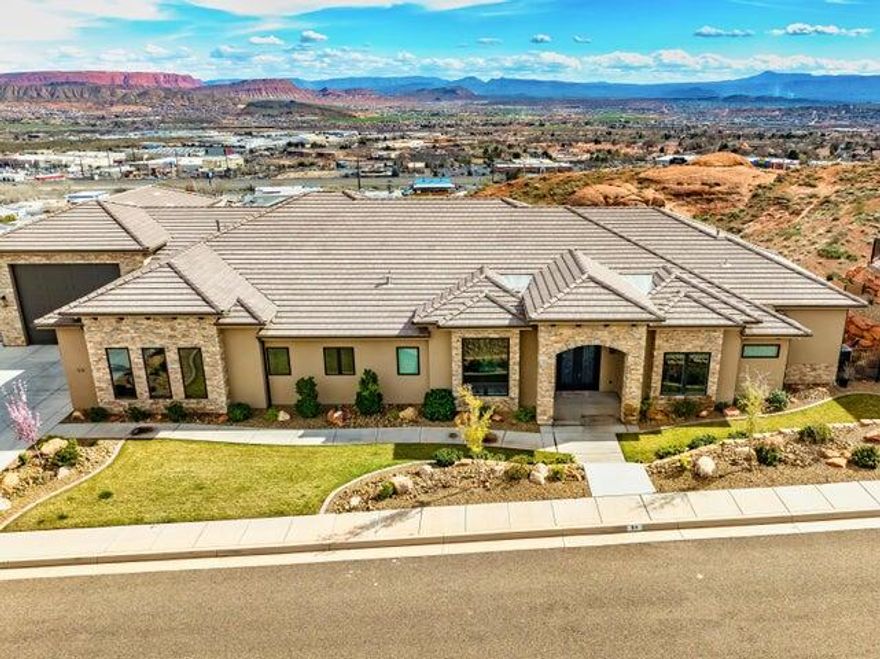 Luxury custom home with unobstructed views in the prestigious hilltop community of Eagle Summit Estates. This beautifully designed home offers 4 spacious bedrooms plus an office with closet, with private ensuite bathrooms for every bedroom. Enjoy a gourmet kitchen with an oversized walk-in pantry, custom ceiling lighting with remote color options, a security system, and numerous high-end upgrades throughout. 

The nearly 50' RV garage with dual A/C units is ideal for RVs, toys, or a workshop. Surrounded by multimillion-dollar homes, this property delivers comfort, privacy, and luxury living.