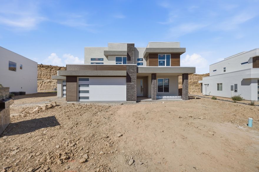 Experience elevated desert living in this stunning Anasazi floor plan located in the quiet, serene, sought after Divario community. Enjoy sweeping city views and ultimate privacy with no future building behind your home, creating a serene backdrop that truly one of a kind. The oversized 3 car garage plus additional side parking offer exceptional space for all your vehicles and toys. With a home layout that blends comfort, functionality, and breathtaking surroundings in a cul de sac with low traffic what's not to love about this home. All Visionary Homes are built with 2x6 framing and R-50/R-19 insulation for extra heat-cooling efficiency. Call Shannon and ASK ABOUT OUR PREFERRED LENDER INCENTIVE and schedule your private showing today.