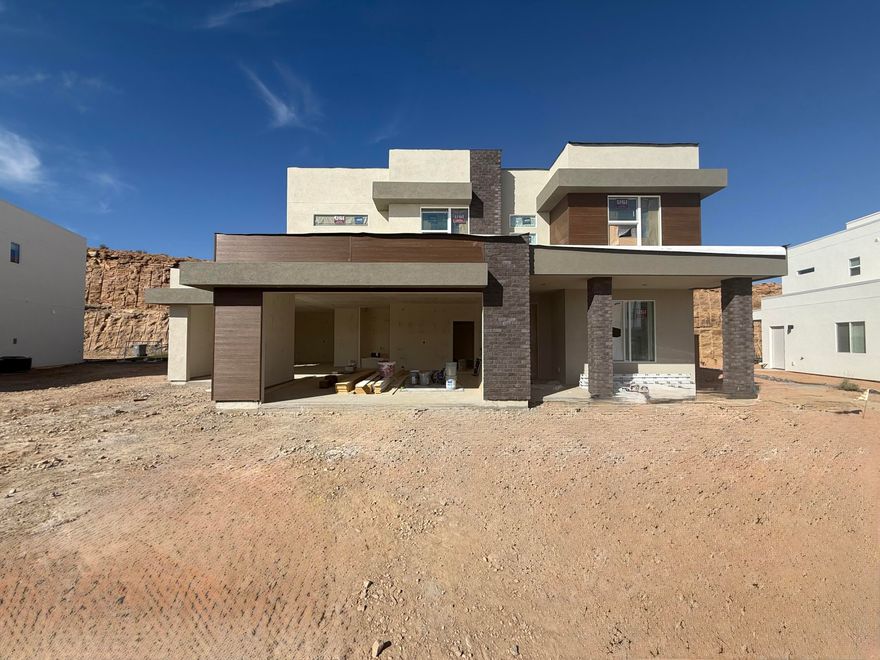 Experience elevated desert living in this stunning Anasazi floor plan located in the quiet, serene, sought after Divario community. Enjoy sweeping city views and ultimate privacy with no future building behind your home, creating a serene backdrop that truly one of a kind. The oversized 3 car garage plus additional side parking offer exceptional space for all your vehicles and toys. With a home layout that blends comfort, functionality, and breathtaking surroundings in a cul de sac with low traffic what's not to love about this home. All Visionary Homes are built with 2x6 framing and R-50/R-19 insulation for extra heat-cooling efficiency. Call Shannon and ASK ABOUT OUR PREFERRED LENDER INCENTIVE and schedule your private showing today.