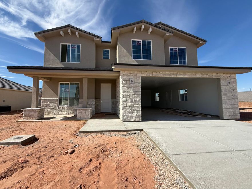 Welcome to your NEW HOME in Legacy at Sand Hollow. Introducing our popular Magdalena floorplan- featuring 4 bedrooms, 2.5 bathrooms, a loft AND flex room! 2 car tandem garage for extra storage or outdoor toys! Just minutes from Jellystone water park, and Sand Hollow Reservoir, where adventure and serenity meet. Carefully tucked away for privacy, yet only 10 minutes from your nearest grocery store and everyday essentials, this community offers the best of both worlds. With low HOA fees, and thoughtfully designed homes, it's an ideal place for anyone seeking the best that Southern Utah has to offer. All Visionary Homes are built with 2x6 framing and R-50/R-19 insulation for extra heat-cooling efficiency. Call Shannon and ASK ABOUT OUR PREFERRED LENDER INCENTIVE and schedule your private showing today.