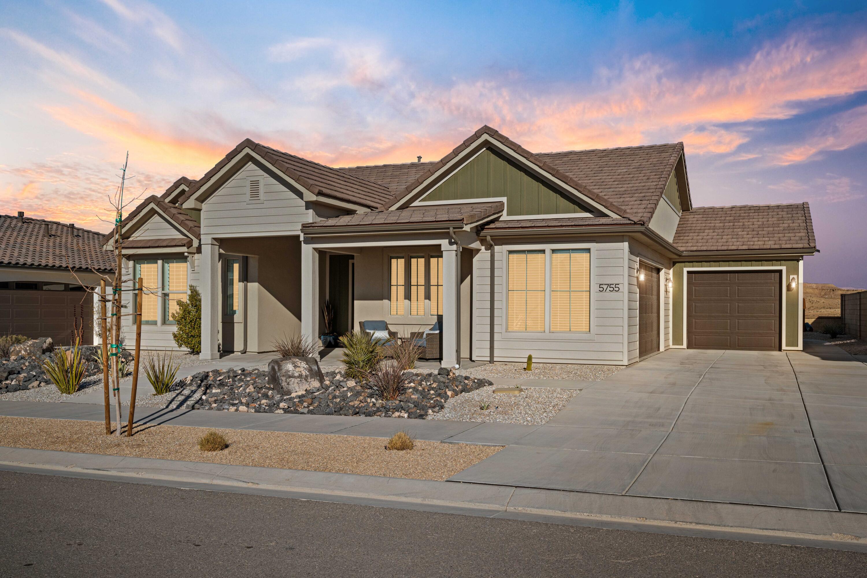 This sumptuous house looks like the model home in Auburn Hills!  Used very little as a second residence, it backs up to no neighbors behind you--just lots of beautiful unobstructed Southern Utah views and gorgeous sunrises.  There is $36K worth of extras in this home including a mud room, patio & sun awning, concrete sidewalk from front to back yard, whole house water softener and reverse osmosis water system, to name a few.  Looking for a turn-key experience? Check out the furniture package in the documents section of the listing or call the agent for more details.  And, as an extra perk to take advantage of the Desert Color lagoon, the sellers are throwing in two stand-up paddleboards AND their golf cart! From the 12' ceilings in the entry to the oversized Quartz island countertop in the kitchen, this home is a 'cut above!'