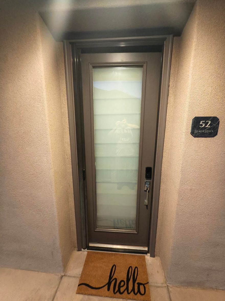 Wake up to sweeping golf course views and the striking beauty of red hills and lava rocks. This turn-key, fully furnished 3 bed, 2 bath condo is flooded with natural light and features granite countertops and a seamless open floor plan. Located in a peaceful gated community with an indoor/outdoor pool, hot tub, and clubhouse. Your private oasis with elevator access awaits.