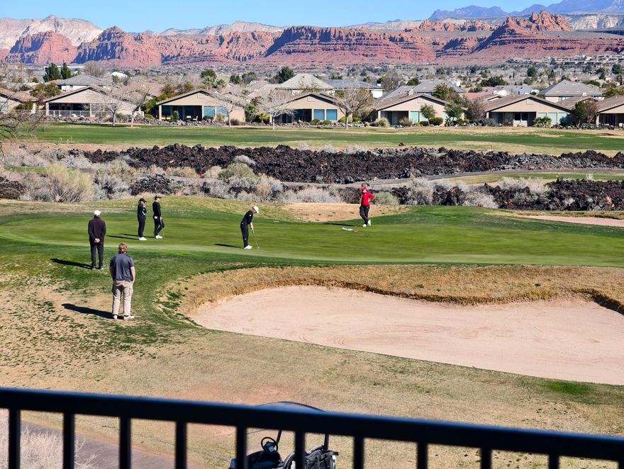 Wake up to sweeping golf course views and the striking beauty of red hills and lava rocks. This turn-key, fully furnished 3 bed, 2 bath condo is flooded with natural light and features granite countertops and a seamless open floor plan. Located in a peaceful gated community with an indoor/outdoor pool, hot tub, and clubhouse. Your private oasis with elevator access awaits.