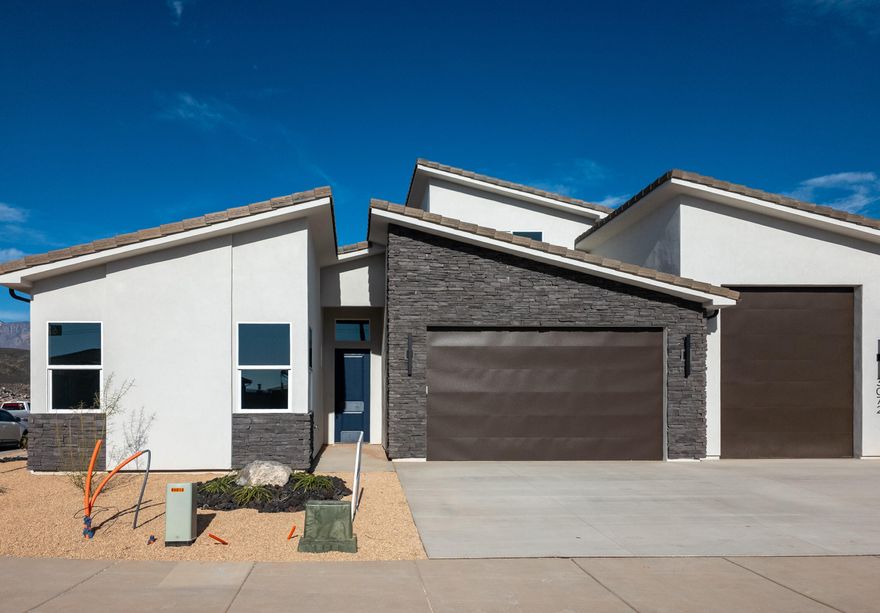 NEW home offers exceptional value with no HOA fees and convenient access to shopping, golf, and outdoor recreation. Separate ADU with private entrance, living room, kitchen, bath, and laundry. Vaulted 13-ft ceiling over an open great room and gourmet kitchen with quartz countertops, soft-close cabinetry. Primary suite with zero-entry tiled shower and spacious walk-in closet Upstairs retreat with two bedrooms and a full bath RV garage: 40' Deep

Included premium finishes
'' Granite or quartz countertops
'' Soft-close cabinets throughout
'' Luxury vinyl plank in all main and wet areas; low-pile carpet in bedrooms and closets
'' 5'' baseboards and an 8' fiberglass entry door
'' Insulated garage doors
'' Desirable corner lot offers added privacy, extra yard space, and eye-catching curb appeal.
" Tankless water heater with built-in recirculating pump for endless hot water and energy savings.
Buy early, and you can still choose many interior selections. Come see how much home and opportunity you get in Peregrine Pointe West.