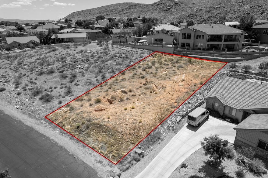 Rare opportunity in Bloomington Hills! This spacious lot offers sweeping views of the surrounding red rock and desert landscape, making it the ideal canvas for your dream home. Located in a well-established neighborhood known for its quiet streets and outdoor lifestyle, this lot provides both privacy and convenience. Close to golf, hiking trails, and top-rated schools. Bring your own builder and take advantage of one of the last premium lots available in the area.