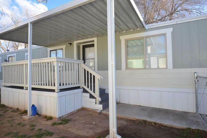 Welcome home to this adorable, well-cared-for trailer in a great location within Mammoth Mobile Home Estates. This charming home features a covered front porch, perfect for relaxing and enjoying your surroundings. Inside, you'll love the updated kitchen and flooring, creating a fresh, inviting space that feels both comfortable and functional. Pride of ownership shines throughout, making this a fantastic place to call home. Affordable, move-in ready, and full of charm—this one is a must-see!