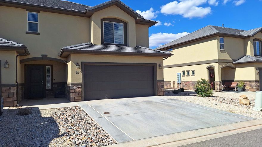 This beautiful high-end, well maintained, end unit BlackHawk Townhome centrally located in the Tonaquint area of St George! Nearby are schools, parks, golf, shopping, and restaurants are just minutes away. Upgrades include beautiful cabinets soft/close drawers and crown moldings. Granite countertops throughout including laundry room. All kitchen appliances are included.  Ample storage space. Central vac system, including hose and attachments. Large Primary bedroom with walk in closet and jetted bath tub. Fenced back patio.
Amenity's include swimming pool, play ground and shaded pavilion.
This is an OWNER/AGENT LISTING.