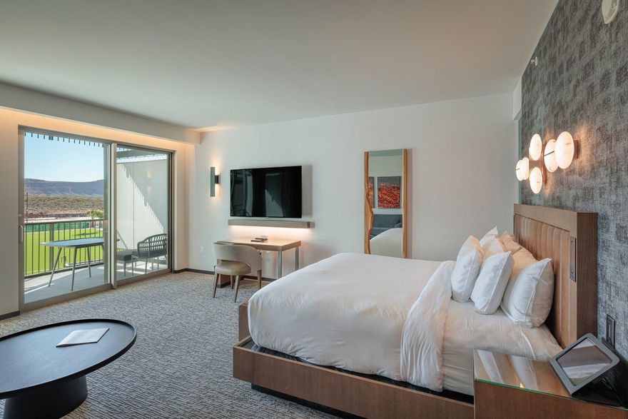 Positioned on the second floor, this King residence offers sweeping views of the stunning Red Rock landscape, creating a dramatic backdrop for your private retreat. Designed within the Resort Center Studios, the space combines modern elegance with effortless comfort. Inside, you'll find premium Wolf and Sub-Zero appliances, high-end finishes, and a thoughtfully designed layout that maximizes both style and functionality. Step onto your spacious balcony to take in the striking scenery and enjoy seamless indoor-outdoor living. Ownership includes access to world-class amenities such as championship PGA golf, exceptional dining venues, a full-service spa, state-of-the-art fitness center, and expansive meeting and convention facilities -- with even more to come. Offered fully furnished and completely turn-key, this residence is currently participating in the rental program, creating a unique opportunity for both personal enjoyment and income potential.