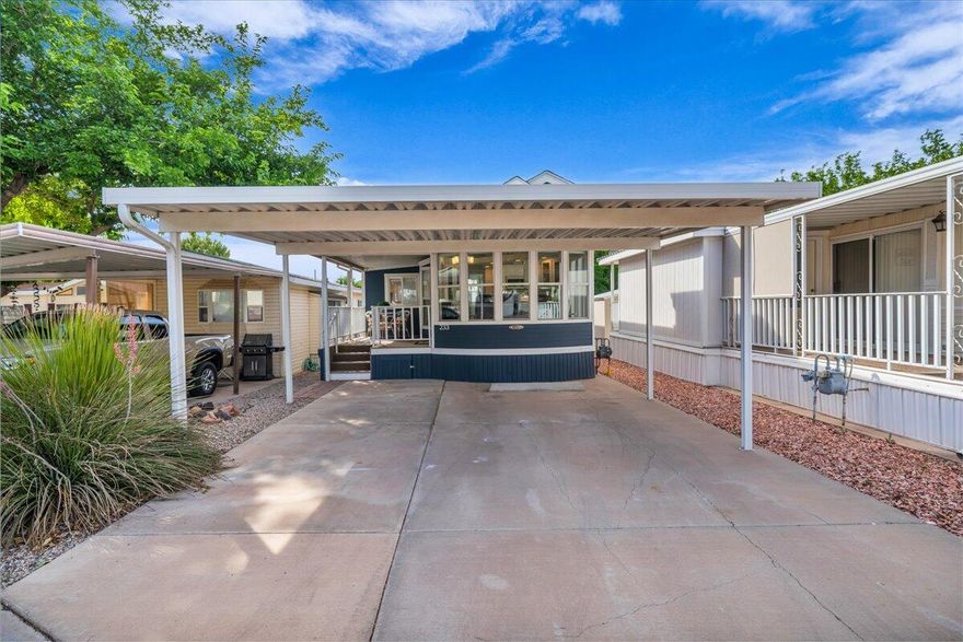 Welcome to the next chapter of your life! This charming and recently refreshed home invites you to relax, unwind, and enjoy all the comforts it has to offer. Thoughtfully updated with fresh paint, luxury vinyl plank flooring, a new HVAC system, refrigerator, and a versatile over-the-range convection oven/microwave/air fryer combo. Furnishings include a hide-a-bed couch, reclining loveseat, and a swivel rocker/recliner — all ready for you to move right in and feel at home. Step outside to a spacious back deck, perfect for entertaining or simply soaking in the peaceful surroundings. Nestled in a friendly, cherished neighborhood, this home is just minutes from outdoor adventures — including Zion National Park, Snow Canyon, Anasazi heritage sites, hiking and biking trails, and world-class red rock climbing. With mild winters, stunning desert landscapes, and welcoming neighbors, this is more than just a home it's your new beginning. Furniture negotiable. Schedule your showing today and move in tomorrow! Buyer to verify all information.