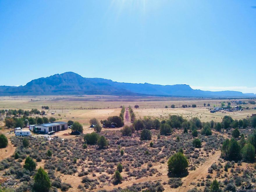 Amazing property to be ''Off Grid''
Solar, power, and Water well owned. Awesome views of drmatic cliffs, and panoramic views. 5 car shop, bath, electricity, RV hook-ups, septic tank in place. Large Cellar for multi use.
Water Right #81-4091 1 Right 1.90 Acre Ft Water Right #81-4862 1 Right 1.756 Acre Ft
