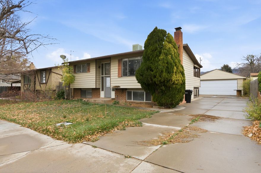 This property is a steal at this price. Enjoy this large single family 4 bed 2 bath home with
no attached walls. Having side yards on both sides protects you from hearing your
neighbors through the adjoining walls which can be a problem in twin homes or
townhomes. A big back yard will be perfect for growing a large garden. The 2 car
garage has a separate attached workshop perfect for those do-it-yourself projects. The
fresh paint and new carpet makes the home ready for your own personal touches. A
spacious living room is upstairs, and an equally large bonus room downstairs gives you room to stretch out. The wood-burning stove makes winter nights cozy and warm. The home is move-in ready for you to enjoy.