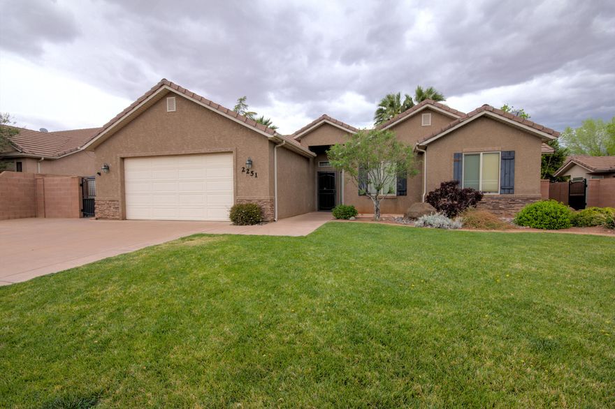 This charming, four bedroom two bath home features inviting open layout with cozy fireplace and hardwood/tile floor floors throughout majority of the home. The spacious primary suite offers separate tub and shower along with large walk-in closet. You'll love the extended pantry in the kitchen and the beautifully landscape secluded yard, plus 2 storage sheds and two car garage.