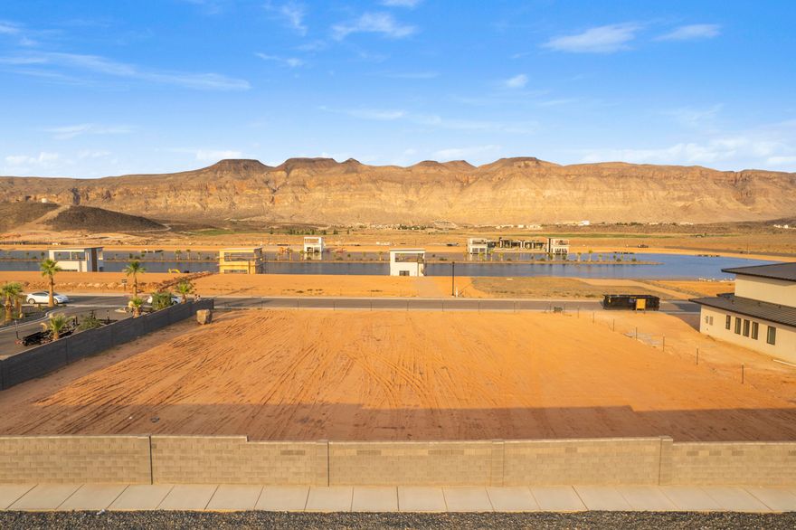 SELLER FINANCING AVAILABLE 0% Interest 0% payments 3 years $300K down. 

Build your dream home in Southern Utah's premier gated lakefront community, Southern Shores. This half-acre, build-ready lot sits just steps from the private surf lake and beach, offering the feel of lakefront living without the price tag. Enjoy full access to the surf pool, cable lake, pickleball/tennis courts, and more. Take in stunning views of Pine Valley Mountain and the Hurricane Cliffs, with top-tier golf and reservoirs just minutes away. This is lake life, elevated.