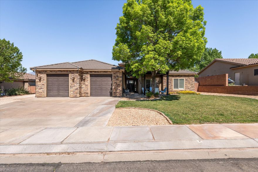 This home features a very spacious kitchen/great-room layout with 3 bedrooms plus a large office that could be 4th bedroom. The location of this home is great with quick access to shopping and  Sand Hollow but with faster I-15 access than downtown Hurricane or out by the lake. Home has RV/trailer parking and nearly new patio covers in the front and rear of home. Come home and enjoy the large Cal-Spa Swim Spa which is included in purchase.