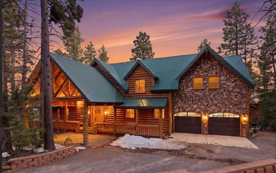 Refined Mountain Luxury in the Heart of Duck Creek Village: Privately nestled among towering pines in a pristine alpine setting, this cabin is a masterfully crafted mountain retreat where timeless design meets elevated comfort.

Thoughtfully positioned to capture both serenity and adventure, this exceptional residence offers an immersive lifestyle defined by nature, space, and sophistication. A striking wood exterior welcomes you into an interior rich with character, featuring vaulted ceilings, expansive windows that frame the surrounding forest, and a seamless blend of natural textures and upscale finishes. The open-concept great room is anchored by a grand fireplace, creating a warm and inviting atmosphere ideal for both cozy evenings and lively gatherings with friends and family. The chef-inspired kitchen is designed for both function and beauty, offering generous prep space, quality appliances, and effortless flow into the dining and living areas. Every space has been curated with intention, balancing rustic charm with refined mountain elegance.

Well-appointed bedrooms provide a peaceful retreat, while additional living spaces offer flexibility for hosting, relaxing, or creating unforgettable memories with family and guests. The expansive wrap-around decking extends the living experience outdoors - perfect for morning coffee among the pines or evenings under the stars.

Surrounded by year-round recreation, with direct access to ATV and snowmobile trails, this property delivers the ultimate mountain lifestyle - whether as a luxurious full-time residence, private escape, or high-end investment opportunity.