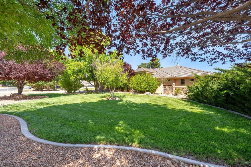Out where the skies feel bigger and the neighbors come with hooves, this 3 bedroom, 3 bathroom home on .90 of an acre in Diamond Valley delivers the country lifestyle without sacrificing comfort or quality. This home blends quality construction with wide-open functionality. From the stone-accented front entry, you're welcomed into a spacious foyer framed by arched openings that lead into the main living area. The great room features a beautiful stone fireplace with custom built-ins, creating a warm focal point while still feeling open and inviting. Large windows bring in natural light and showcase views of the property. The kitchen and formal dining area are designed for gathering, offering rich wood cabinetry, generous counter space, and easy flow that makes entertaining effortless. Durable flooring throughout the main living areas adds both style and practicality. The primary suite is spacious and private, complete with dual vanities, a soaking tub with tile surround, a separate walk-in tiled shower, and an expansive walk-in closet. Additional bedrooms are well-sized, and with three full bathrooms, there is flexibility for guests, a home office, hobbies, or multi-use space. A dedicated office and well-appointed laundry room add even more everyday convenience. Outside, the lifestyle truly expands. The covered patio provides shaded seating and mountain views, while the fully usable .90 acre lot includes covered corrals and livestock facilities ideal for horses or other animals. There is ample space for RV parking, trailers, equipment, and room to add a shop. A storage shed and fenced yard areas provide added functionality. This is Diamond Valley living done right. Space to roam, room to grow, and a home built to support the lifestyle you've been looking for.