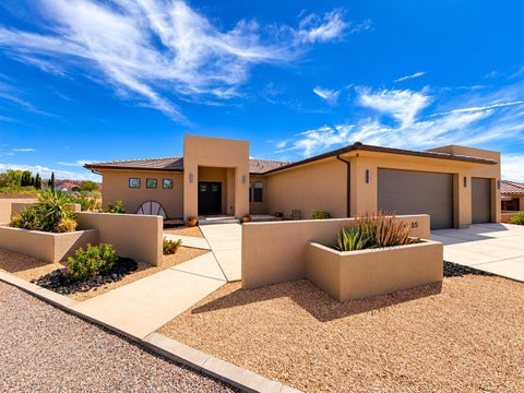 Photo of 65 S Feliz DR, Ivins, UT 84738 (MLS # 26-276768)