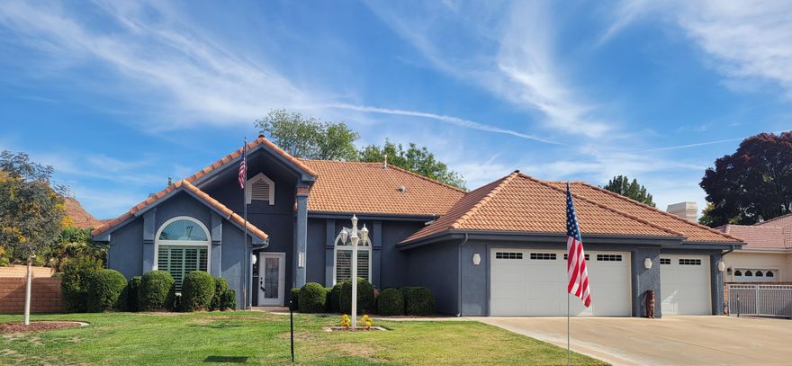 This former ''Parade of Homes'' is located in the ''Rancho'' Bloomington subdivision and offers mature land scaping, peace, tranquility and quick access to shopping, golfing, parks, trails, recreation and is just minutes to I-15.  This functional 4 bedroom, 2 bathroom, 3 car garage home features the great room kitchen/dining/family room concept  plus a large multi functional formal living area with tons of room for a pool table, den, gym or an escape.  The spacious cover patio and private fenced yard is ready to grill up your favorite meal and entertain all your family and friends. This home also has a large fenced in RV or ATV parking pad to and secure the ''toys''.  One other note worthy item, Dixie Power provide the electricity supply.