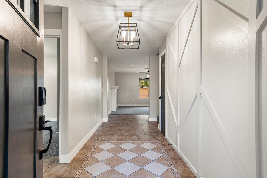 Seller offering $5,000 concessions toward to buyers closing costs. Fully remodeled 5-bedroom home on a quiet cul-de-sac in Ivins with NO HOA and a .34 acre lot with great views of Red Mountain. This ~2,500 sq ft home has been completely renovated from top to bottom, including a recently epoxied garage floor,  new HVAC system and water heater, roof tile, new doors and trim with fresh paint throughout, new carpet, modern lighting, and all-new appliances with granite and quartz countertops. The landscaped front yard and fully enclosed backyard offer endless possibilities for a pool, casita/ADU, RV parking, or other projects. Located near Unity Park, Fire Lake Reservoir, Rocky Vista University, and area golf courses. Move-in ready and priced to go quick! Some photos include digitally enhanced renderings showing potential design options. These are for illustrative purposes only and are not included in the sale.