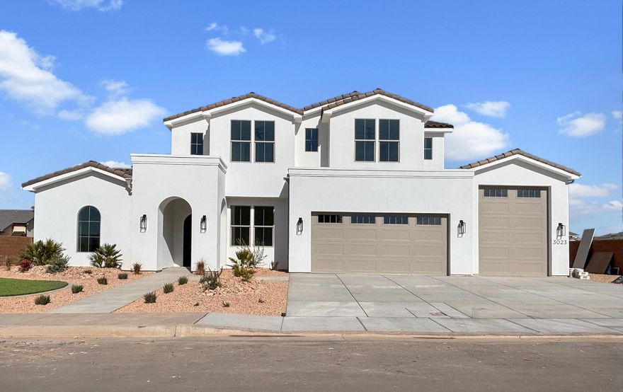 OPEN HOUSE - Tomorrow Friday- Sunday 10-7 come see this Brand-new Chase Construction home in a prime St. George Washington Fields location. This 6 bed, 4 bath, 4,075 sq ft residence sits a block to George Washington Academy and minutes from Crimson High School, just 1.4 miles from the new St. George Temple. Thoughtfully designed with upgraded finishes, a large family room, spacious butler's pantry, functional mudroom, and laundry access from the primary walk-in closet. The backyard is level and pool-ready with plumbing in place. Plumbed for water softener, wired for cable, beautifully finished front yard with artificial turf, and all backed by builder warranty. You won't want to miss this.