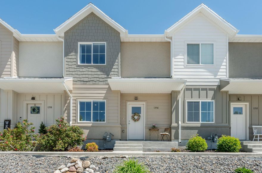 Beautiful newer townhome in a highly desirable Sunset community, ideally located next to Sunset City Hall and backing to a quiet city park. This well-designed 3-bedroom, 2.5-bath home offers approximately 1,345 sq ft of comfortable living space with a functional, open layout and modern finishes throughout.
The main level features stylish LVP flooring, granite countertops, ample cabinetry, and a spacious kitchen with pantry. The living area is inviting and well laid out, perfect for everyday living or entertaining. Upstairs you'll find all three bedrooms along with a convenient full laundry room.
The property includes a 2-car garage with additional driveway parking, plus nearby guest parking. The setting offers both convenience and a peaceful neighborhood feel, with the park directly behind the home providing open space and added privacy.
Located just minutes from I-15, Hill Air Force Base, Weber State University, Ogden Regional Medical Center, and a variety of shopping, dining, and recreation including Lagoon and Farmington Station. Easy access to multiple highways makes commuting simple in any direction.
Buyer to verify all information, including square footage.
