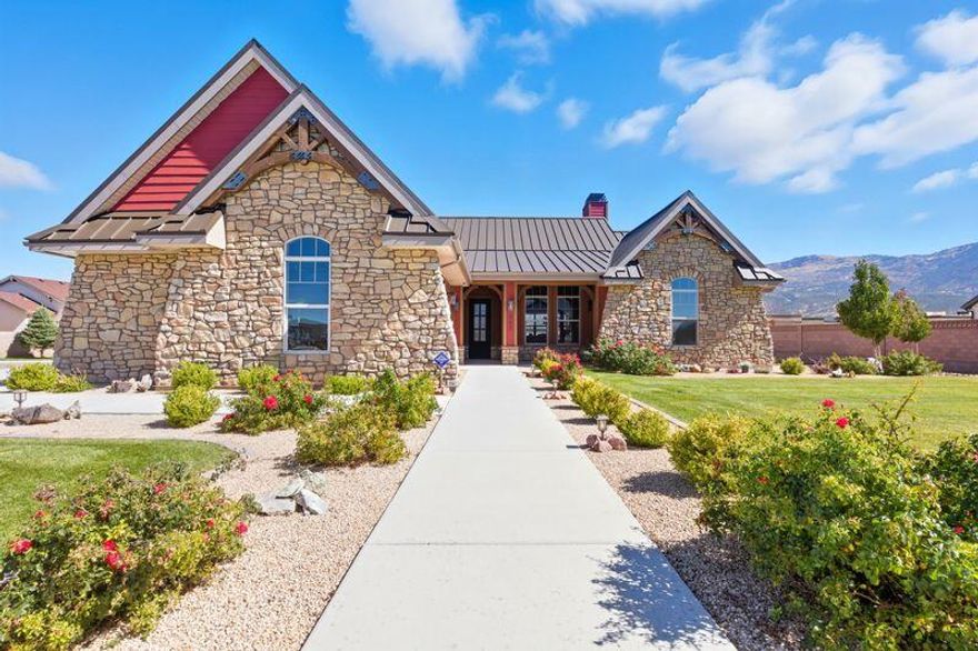 Move-In Ready Perfection with Stunning Views This immaculate 3 bed, 2.5 bath home with office and mudroom offers single-level living at its finest! Lightly lived in and in pristine condition, it features a smart home system with alarm, toe-kick motion lighting in kitchen and baths, custom window shades, gas fireplace, walk-in shower with rainhead, his & her sinks, and a spacious walk-in closet. Enjoy a formal dining room, breakfast nook, tons of storage, and beautiful natural light. Relax on the front or back porch under the durable metal roof while soaking in stunning mountain views. Fully landscaped, 2-car garage, and conveniently located near shopping and recreation. Option to buy fully furnished—just move in!