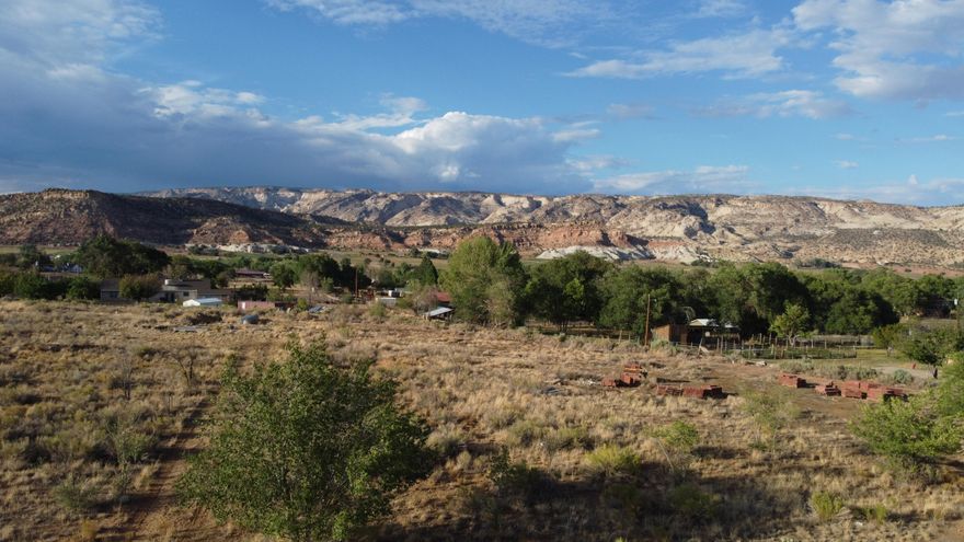 Just one block off Highway 12, this 2.26 acre commercial parcel offers easy access and fantastic views. The property is development-ready with a 2'' water meter, sewer stubbed in, and a power pole on site for easy connection to Garkane power. Build your dream home on this spacious lot and take in the beautiful views of Escalante.