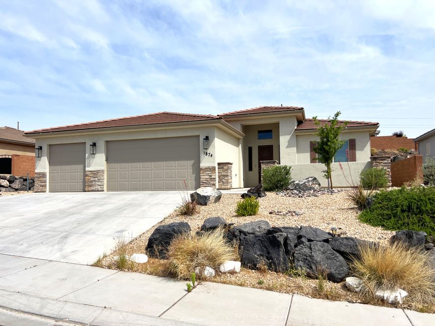 This is a great 4 bedroom home with 3 car garage. Open floor plan, Quartz countertops, custom cabinets, nice stainless appliances, Fridge included, New carpet, beutiful luxury vinyl planks, Ceiling fans in every room, 2.5 inch blinds in all windows, nice artificial turf and good size patio to enjoy the back yard. Views from the front patio, and privacy in the back yard. This will be a great place to live and relax. Homes located in the Fire Rock subcivision in Hurricane Utah not far from shppping, dinning, and recreation at sand hollow resevoir. Come see this home it's a great deal in a good location. This home is well built and in good shape. Move in ready.