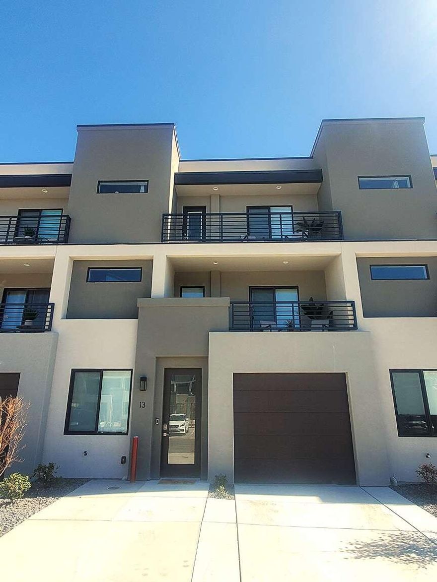 Fully furnished townhome located in The Vue at Green Valley community. Nightly rental approved! Built in 2021, this gorgeous, modern-style townhome has over 2540 square feet with 5 bedrooms, 4.5 baths, 2 living rooms, 3 balconies, and a long one-car garage. It can can sleep up to 16 comfortably. Three of the bedrooms each have their own bathrooms. Perfect for nightly rentals or personal vacations! The HOA covers access to the community swimming pool as well as basketball and pickleball courts, Internet, and landscape care. In 2024, this property generated $33,518 of income.