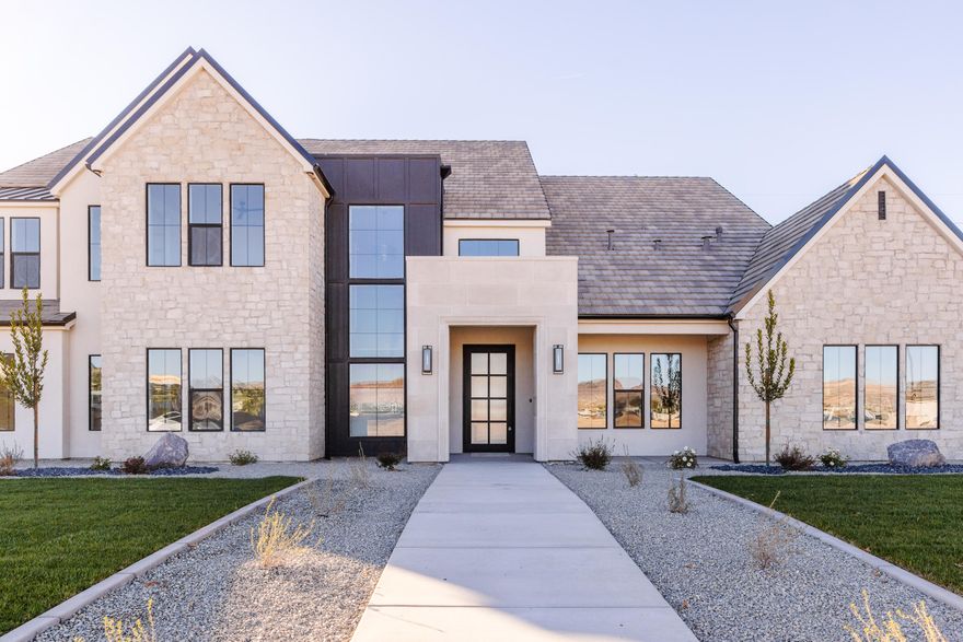 UNPARALLELED EXCELLENCE FROM LUXE HOMES IN UPSCALE GROVE SUBDIVISION. ON 2/3 ACRE LOT NEXT TO RED CLIFFS TEMPLE AND IN CRIMSON CLIFFS SCHOOL BOUNDARIES. Features custom 20x40 extra deep pool & spa, oversized 30x60 pickleball / sport court, two (2) 10x17 in ground trampolines. Interior features: WOLF & SUBZERO APPLIANCES, custom cabinetry, 7 beds, 9 baths, oversized dedicated GYM, music room, office, craft/homework/flex space, spa like primary bedroom retreat w/ oversized glass enclosed shower, oversized tub, & 2 separate toilets. Includes a laundry room on each floor, bunk room upstairs and so much more! RV/boat + toys will fit in oversized garage & side parking. Smart wiring for shades, surround sound / nearly whole home audio distribution, & security cameras. Misting system. Owner/agent