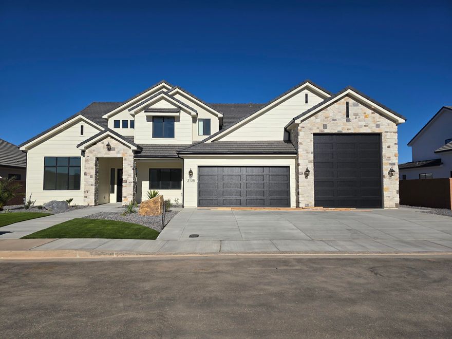 Brand new, beautiful home built by B1 Builders. Detailed interior with impressive finishes. Lots of storage, butler's pantry, 2 laundry rooms, guest bedroom on the main level and an RV garage.  RV Garage measurements - about 50' deep, 17' wide with a 13'x14' garage door.  Full landscape, and block walls on three sides included.