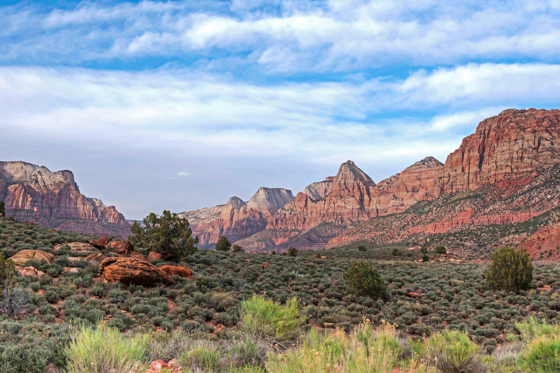 Zion Overlook lot in Springdale has the most magnificent panoramic view of Zion Canyon! Enjoy a birds-eye view looking directly into Zion Canyon with the majestic red rocks towering on both sides with the rich, green Virgin River Valley in the foreground. Enjoy the iconic Zion cliffs as they light up to brilliant shades of orange and magenta at sunset! Stargaze into the twinkling dark sky after nightfall where the Milky Way shines brightly. This is the ultimate Zion view lot, with stunning 360-degree views of Zion! Perched on a knob overlooking Springdale, this lot offers ultimate privacy! Fiber Optics are available so you can be connected even while you enjoy the best that nature has to offer. We can suggest architects and builders, familiar with the area, who can help you create your dream home.