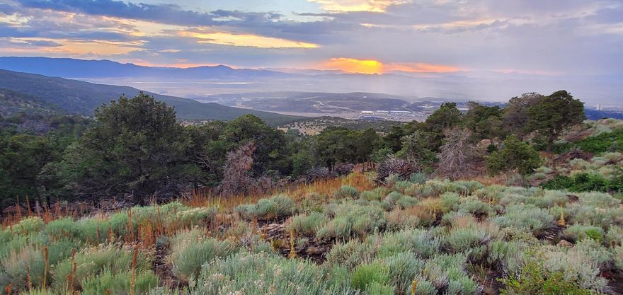 Discover the perfect opportunity to build your dream home on 8.86 acres in Cedar City, Utah. Nestled within the tranquil Cedar Highlands community, these properties offers stunning views of the surrounding mountains and valley. Enjoy the serenity of nature while being just a short drive from the amenities of Cedar City. Sale includes parcels D-1024-0005-0001 and A-1024-0005-0002.  Dues cover snow removal. Water is provided by the Water Conservancy District. Note: Utilities are in the street. Buyer to verify all information. Minimum of 30 day rental required for this area (no short term).