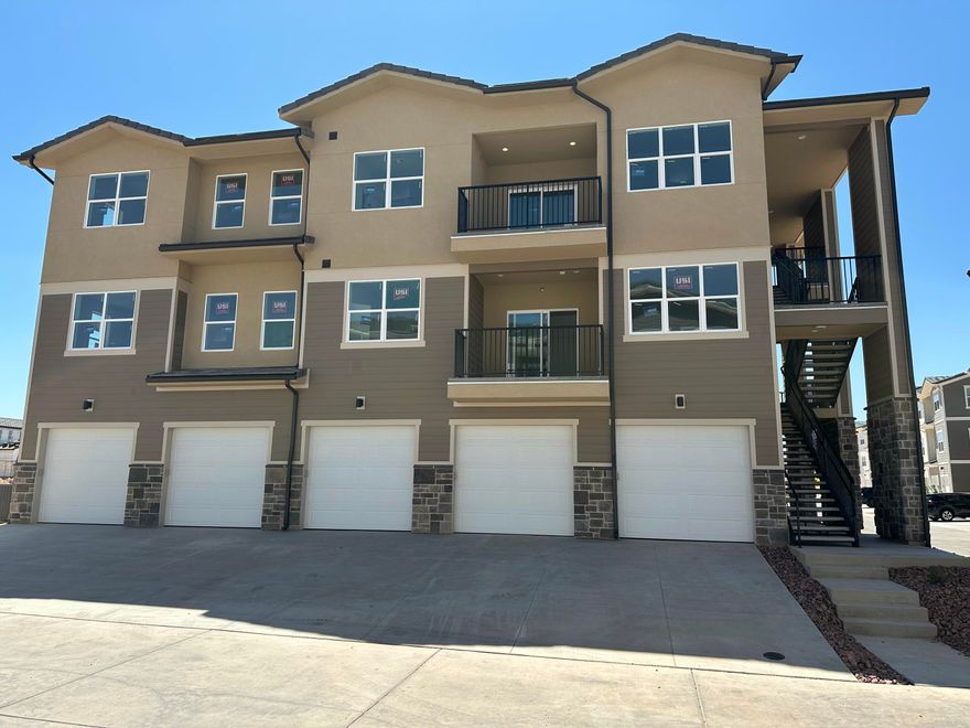 2ND LEVEL CONDO IN HIGHLY SOUGHT AFTER DESERT COLOR!!! NOT ONE, BUT TWO LARGE COVERED DECKS*UPGRADES THROUGH OUT INCLUDED!!! WHITE SHAKER CABINETS*WHITE QUARTZ COUNTERTOPS*DOUBLE SINKS. GARAGE IS EV READY WITH 220V PLUG INSTALLED AND SOOOOO MUCH MORE!!! WON'T LAST LONG AT THIS PRICE!!! NO NIGHTLY RENTALS, 6 MONTH MINIMUM.