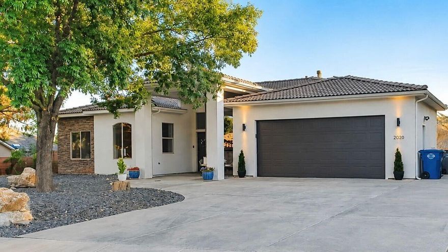 Welcome to this beautiful, clean, modern home in the Knolls at Little Valley! A desirable neighborhood with no HOA. Situated on a spacious .48 acre lot with stunning red rock and city views with RV parking in addition to the 2-car garage. Inside, you'll find an open and inviting floor plan with plenty of natural light, a well-appointed kitchen, and shiplap walls with stunning finishes. The basement with a second kitchen, theatre room, living room and bathroom creates space for guests or investment options with enterainment. 2 new  HVAC units (upstairs & basement) with warranty and brand new water heater with 5 year warranty. From the walkout basement you join a fully landscaped backyard against the mountain. Located just minutes from parks, hiking and biking trails, shopping, dining, and top-rated schools, this home truly has it all.