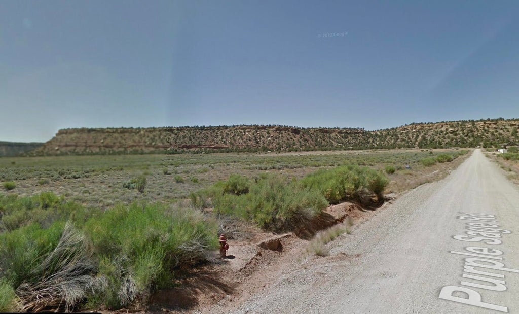Photo of 2745 N PURPLE SAGE RD, Apple Valley, UT 84737 (MLS # 26-273705)