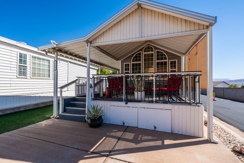 Photo of 1150 W Red Hills Parkway 152 #152, Washington, UT 84780 (MLS # 26-276856)