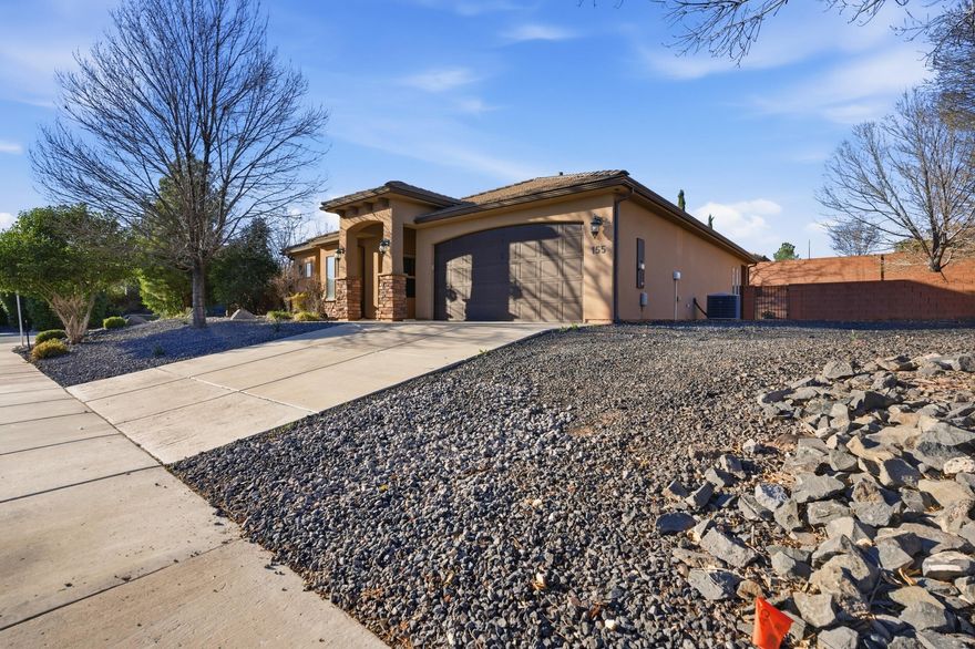 Welcome to 155 E Holly Way -- Your Perfect Blend of Comfort, Location & Space in Washington, Utah!

Discover an exceptional opportunity in the desirable Hobble Creek neighborhood! This well-maintained single-level home offers 4 bedrooms, 2 bathrooms, and 1,771 square feet of thoughtful living space -- perfect for families, entertaining, or anyone seeking room to grow.  Newer flooring with LVP in all the high-traffic areas and comfy carpet where you want it.  You will appreciate the very private nature of the back yard with tall walls, lots of shade, mature vegetation and trees and easy to maintain.

Step inside to a bright, open layout that effortlessly connects the living room, dining area, and kitchen -- ideal for everyday living and gatherings. Enjoy a large pantry and walk in laundry room right off the garage.  

The primary (master) suit, with its ensuite bath is perfect with individual vanities and sinks, a proper water closet, walk-in closet with a custom high-end wardrobe system (you didn't know you needed until you discover this for yourself!)  Walk in shower with rainfall system and separate jetted tub to release stress from time to time.

At the front of the home, off the entry foyer sits 3 additional bedrooms (possible: home office, guest room, craft room etc.) with access to its own bathroom.

One of the standout features of this property is the large corner lot with full landscaping both front and back -- a rare find in this price range. Imagine relaxing evenings on your covered patio, kids and pets playing on the lawn, and the possibility to add gardens, outdoor living features, or even a backyard oasis.

The other three bedrooms are at the front of the home, clustered in their own wing of the home.  Each room, though similar in size, is distinctively different in their configuration making them ideal as a home office space or as bedrooms and guest suites. Unbeatable Location:
- Walking distance to the Virgin River and Sullivan Field trails for biking, walking, and outdoor fun (Dog Park too)
- Quick access to Costco, Smith's, Walmart, dining, and everyday conveniences just minutes away.
- Easy access to I-15 and SR-7, putting Red Cliffs Desert Reserve, Sand Hollow Reservoir, and Zion National Park within reach for weekend adventures.

Whether you're searching for your next family home, downsizing without compromise, or investing in a prime Southern Utah location, this property delivers space, comfort, and lifestyle -- all in a community with low HOA dues and strong neighborhood appeal.

Don't miss your chance to own this move-in ready home in one of Washington's most accessible and beloved areas!