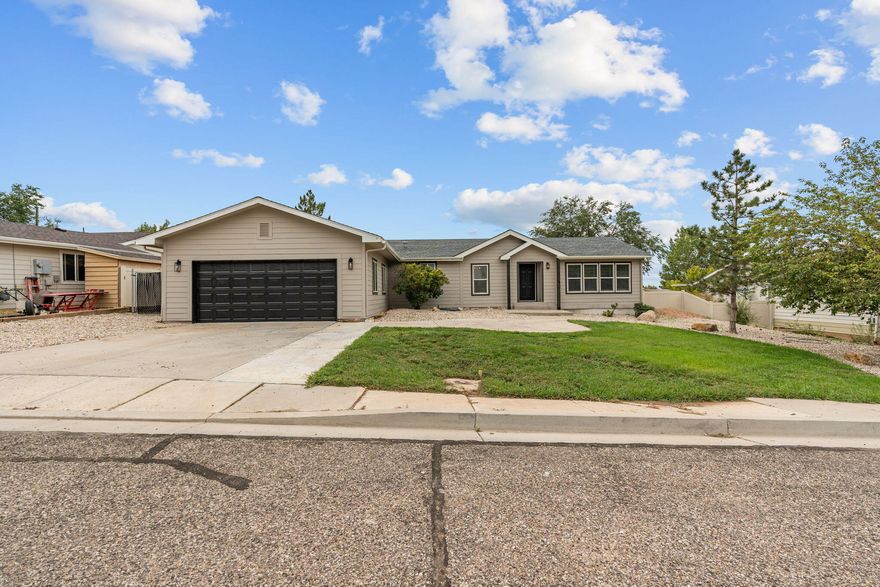 Newly remodeled 4-bedroom, 2-bath home in a prime central location! Just minutes from the golf course, library, and all the best local amenities. Enjoy direct access to nearby hiking and biking trails, perfect for outdoor enthusiasts. This spacious home features modern upgrades throughout, offering comfort, style, and functionality for families or those needing extra space. With its rare combination of size, location, and price, this opportunity won't last long. Whether you're entertaining guests or enjoying quiet time at home, this property checks all the boxes. A must-see at a price point rarely found for a 4-bedroom home in this area. Come fall in love today!