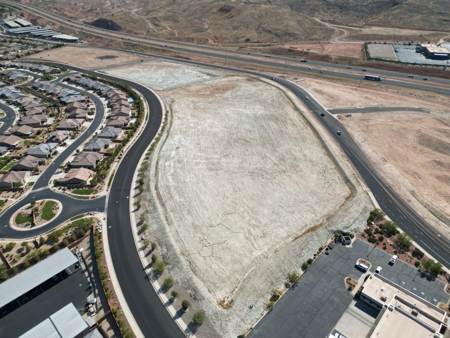 Incredible opportunity in this expanding area of St. George in Sun River. Smith's Marketplace, Del Taco, In&Out, Cafe Rio, Les Schwab and Auto Zone have all called their spots! Commercial land for sale, right on Pioneer Parkway with high visibility from the freeway. Listing information deemed reliable, buyer to verify.