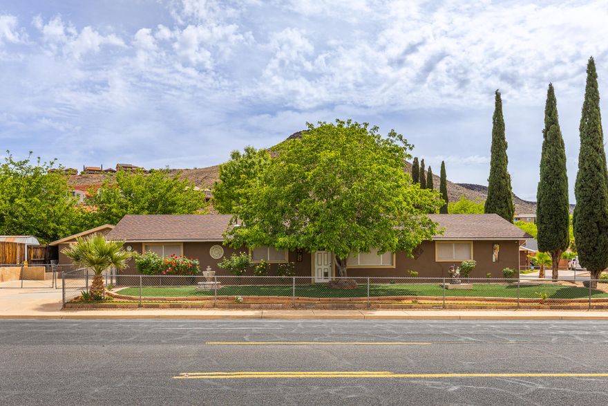 Here's an immaculate updated  home with a ton of potential. Think of the garage as a blank slate: you could turn it into a casita, a little salon space, or a workshop. Inside, there's room to add a fourth bedroom or use the space however you need. Plus, you've got RV parking and a bunch of recent upgrades: new roof, new AC, new heater, and fresh flooring all done in the last two years. It's ready for someone to come in and make it their own.